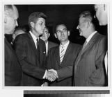 JFK shaking hands 